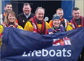  ??  ?? Mary with members of Wexford RNLI last week before heading for home.