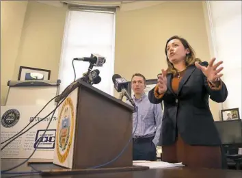  ?? Steve Mellon/Post-Gazette ?? During a news conference Monday, Allegheny County Controller Chelsa Wagner said that her office would audit the county health department’s practices to evaluate lead levels in children. Behind Ms. Wagner is Daniel Kusbit, an analyst for the...