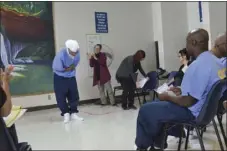  ??  ?? A Centinela State Prison inmate takes a bow after his play was performed as part of the facility’s Out of the Yard playwritin­g program on Thursday. JULIO MORALES PHOTO