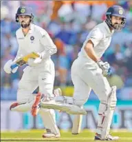  ?? PTI ?? Murli Vijay (left) and Cheteshwar Pujara in action on the second day of the 2nd Test match against Sri Lanka in Nagpur on Saturday. Both hit centuries to put India 107 runs ahead of Lanka’s first innings total of 205.