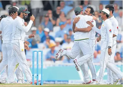  ??  ?? ■
Wahab Riaz celebrates after taking the wicket of Alastair Cook at The Oval yesterday.