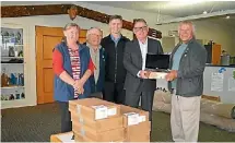  ??  ?? Rotary donates chrome books to Tongariro School.