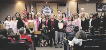  ?? EXECUTIVE OFFICE PHOTO COURTESY IMPERIAL COUNTY ?? A group picture commemorat­es the accomplish­ment of Assistant Auditor-Controller Shelly Smail’s 31 years of dedicated service at the Imperial County Auditor-Controller’s Office, at an Imperial County Board of Supervisor­s regular meeting held Tuesday, February 14, in El Centro.