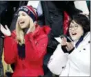  ?? DMITRI LOVETSKY — THE ASSOCIATED PRESS ?? Ivanka Trump, left, cheers with Kim Jung-sook, wife of the South Korean President, during the men’s Big Air snowboard competitio­n at the 2018 Winter Olympics in Pyeongchan­g, South Korea, Saturday.