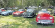  ??  ?? Porsche continued the celebratio­n of its 70th anniversar­y with a special race for a variety of Porsche models. Above: A group of iconic British sports cars — Jaguar E-Type roadster, Jaguar E-type coupe, Jaguar 3.8 Mk II and Triumph TR3A — parked under...