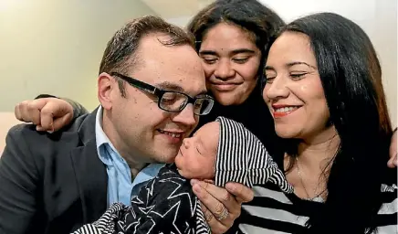  ??  ?? Baby makes four: Porirua mayor Nick Leggett with new son Tane, step daughter Madi Masaga-Pita,11 and wife Emily