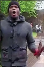  ??  ?? Adebolajo with bloody meat cleaver after the slaughter of Lee Rigby HORROR: