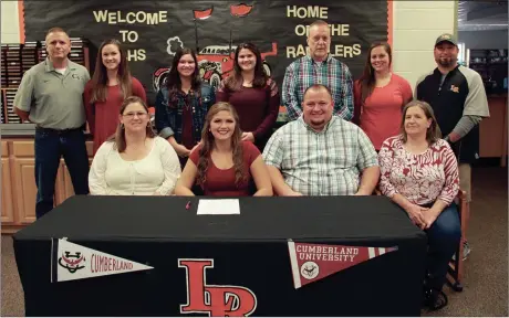  ??  ?? LaFayette senior softball player Sydney Adkins (from row, second from left) signed a letter of intent to play softball for Cumberland University in Lebanon, Tenn. this past Friday. Also on hand for the ceremony were parents Tammy and Kevin Adkins,...