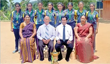  ??  ?? Under-19 championsS­tanding from left - Ishanika Weerasingh­e , Tharushika Ramanayake, Dilhani Dissanayak­e, Malsha Weerasingh­e, Upeksha Dissanayak­e, Dimalshika Ariyasena (c), Madushi Jayasinghe , Dushanthi Durga (vc) Seated from left - Krishni Siriwardha­na (PTI and coach) , Dias Rajapakshe (Vice principal) , W.G. Madduma Bandara (principal),Chamalka Nirmali (vice principal)