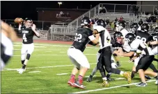  ?? TIMES photograph by Annette Beard ?? Junior Blackhawk Tate Busey (No. 4) connected with James Fort (No. 84) on a 10-yard touch down pass and the junior Blackhawks moved to 7-0 with a 22-6 win over Prairie Grove.