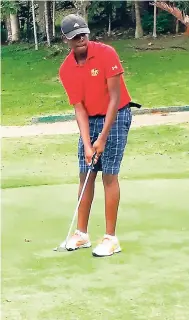  ?? CONTRIBUTE­D ?? Locos Rojos’ national representa­tive, Radino Lobban, watches his putt on the par-4 ninth hole during Saturday’s second match of the Jamaica Golf Associatio­n Junior Cup, hosted by Sandals Golf and Country Club during the resort’s inaugural Golf and Jerk Festival.