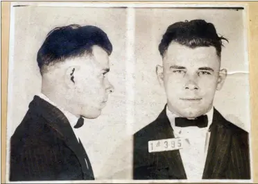  ?? CHARLIE NYE — THE ASSOCIATED PRESS FILE ?? These Indiana Reformator­y booking shots of John Dillinger, stored in the state archives, show the notorious gangster as a 21-year-old. The body of the 1930s gangster is set to be exhumed from an Indianapol­is cemetery more than 85 years after he was killed by FBI agents. The Indiana State Department of Health approved a permit that Dillinger’s nephew, Michael C. Thompson, sought to have the body exhumed from Crown Hill Cemetery and reinterred there.
