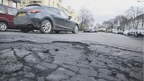  ?? PICTURE: ALISTAIR LINFORD ?? 0 Scotland’s potholes stretch down to a combined depth of almost four miles