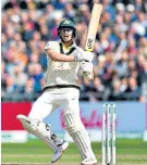  ??  ?? Technique: Marnus Labuschagn­e bats during the opening day at Old Trafford