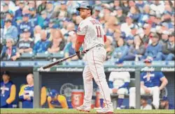  ?? Abbie Parr / Getty Images ?? Boston’s Rafael Devers watches his eventual game-winning two-run home run in the eighth inning on Sunday.