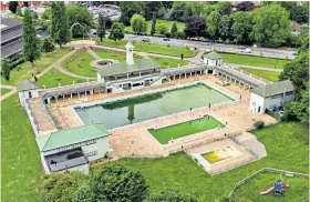  ??  ?? Gloomy future: Despite pools opening again, Peterborou­gh Lido is still green with algae