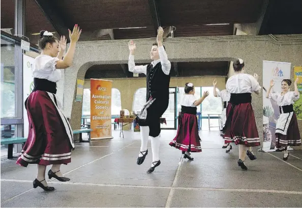  ?? PHOTOS: CODIE MCLACHLAN ?? Italian Appennini Dancers perform during the Heritage Festival press conference at Hawrelak Park on Tuesday.