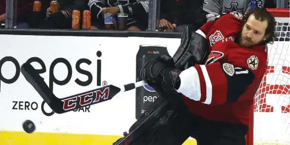  ?? BRUCE BENNETT/GETTY IMAGES ?? Coyotes goalie Mike Smith, who scored a regular-season empty-netter in 2013, found the five-hole with a rink-long shot in the skills event. Said Smith: “I was just as shocked as everyone else.”