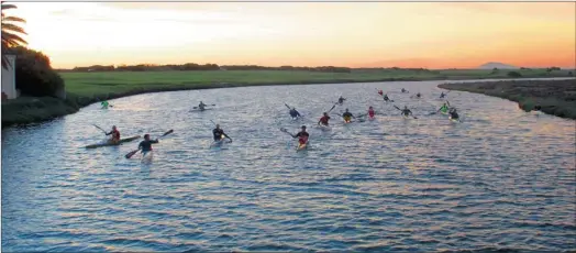  ?? PHOTO: LISA SCOTT/WCN ?? AT RISK: Canoeists who get their exercise on the Milnerton Lagoon past Woodbridge Island run the risk of getting sick if they swallow water from the lagoon.