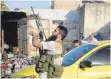  ?? FOTO:AFP ?? Ein Kämpfer der Failak al-Scham-Miliz: Idlib zählt zu den letzten Rebellenho­chburgen Syriens.