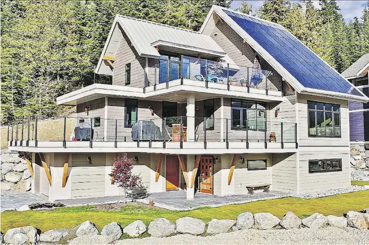  ?? JOERN ROHD/RDC FINE HOMES ?? Net-zero homes produce as much energy as they use. Given rising energy costs they are becoming increasing­ly popular.