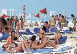  ?? ISRAEL LEAL/AP FILE ?? “U.S. citizens should exercise increased caution in the downtown areas of popular spring break locations including Cancun, Playa Del Carmen, and Tulum, especially after dark,” according to an alert from the U.S. State Department released Wednesday.