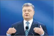  ?? Tatyana Zenkovich Europea n Pressphoto Agency ?? PRESIDENT Petro Poroshenko says Ukraine must act decisively against Russia’s “hybrid warfare.”