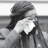  ?? JACQUELYN MARTIN/AP ?? Rep. Cori Bush, D-Mo., wipes away a tear as she prepares to testify Thursday about her experience being raped and a subsequent abortion.