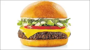  ??  ?? SPROUTING OUT: The part-mushroom burgers, pioneered in the United States, are now available to buy in supermarke­ts, and are served in some schools and office canteens as well. On Monday, the burgers also launched at SONIC drive-in fast-food chains...