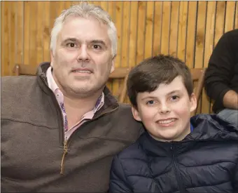  ??  ?? Fergal Donoghue and Conor Donoghue enjoying the action at the Fr Flanagans Boxing Extravagan­za in the Avon Ri Lakeshore Resort, Blessingto­n.