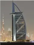  ?? ?? Sterne, wie sie der Verband Dehoga vergibt; Hoteldirek­tor Theodor Gandenheim­er vom Augsburger Maximilian’s vor wertvollem Gemälde – und das Burj Al Arab in Dubai.