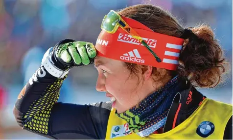 ?? Foto: dpa ?? Der Austragung­sort der nächsten Olympische­n Winterspie­le bereitet nicht nur Laura Dahlmeier Kopfzerbre­chen. TENNIS BASKETBALL