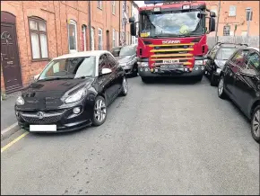  ??  ?? Hinckley firefighte­rs took to the streets to highlight how double sided parking and illegal parking can hamper efforts to reach emergencie­s.