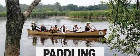  ?? DALE BOWMAN/ FOR THE SUN- TIMES ?? The Sarmiento family was among those who paddled with Wilderness Inquiry during the ‘‘ Explore the Lake Michigan Water Trail’’ event at Illinois Beach State Park.