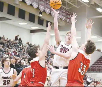  ?? Bud Sullins/Special to Siloam Sunday ?? Siloam Springs senior Mason Cooper shoots over Vilonia defenders during Friday’s game at Panther Activity Center.