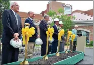  ?? MEDIANEWS GROUP FILE PHOTO ?? Chaplain Zweig, far right, gives the invocation for the groundbrea­king ceremony for the expansion at Elm Terrace Gardens. Pictured are, from left, Dick Stein, president of resident council; then-Lansdale Mayor Andrew Szekely; tnen-Lansdale Borough Manager Jake Zeigler; Elm Terrace Gardens Board of Directors Chairman Dil Kulathum; and President and CEO Timothy Murphy in July 2015.