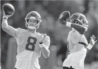  ?? ALEX BRANDON/ASSOCIATED PRESS ?? Washington quarterbac­k Kyle Allen, left, has replaced Dwayne Haskins, right, as the starter after the team’s 1-3 start. Haskins dropped to No. 3 on the depth chart and won’t be active for Sunday’s game against the Rams.