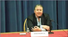  ?? Darien TV79 / Darien League of Women Voters / Contribute­d photo ?? David Brown, a Darien Board of Education member, has denied accusation­s that he was using a symbol of white supremacy during a candidate’s forum.