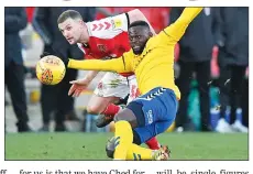  ??  ?? TUSSLE: Charlton’s Igor Vetokele battles with Fleetwood’s James Wallace