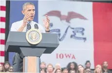  ??  ?? PUTTING DOWN ROOTS: In this Sept 14, 2015 file photo, President Barack Obama, speaks at North High School in Des Moines. Few states have changed politicall­y with the headsnappi­ng speed of Iowa.