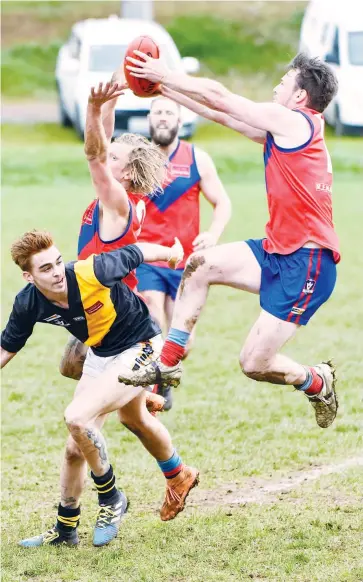  ??  ?? Charlie Park flies in to take a strong overhead mark for Buln Buln in the second quarter of the seniors game. Photograph­s: CRAIG JOHNSON