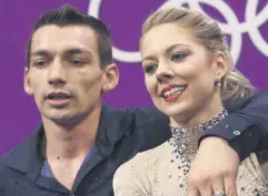  ?? [AP PHOTO] ?? Alexa Scimeca Knierim and Chris Knierim, of the USA, react Wednesday as they wait for their scores to be posted after their performanc­e in the pair figure skating short program in the Gangneung Ice Arena at the 2018 Winter Olympics in Gangneung, South...