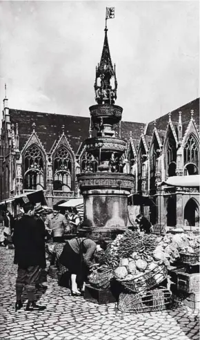  ?? GETTY ?? Antic mercat de la font a Braunschwe­ig, Alemanya, en una imatge del 1925