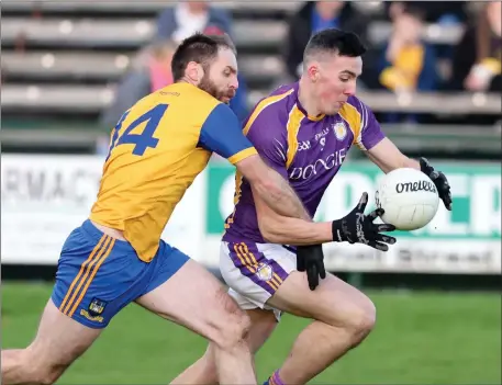  ?? ?? Richard O’callaghan makes a challenge on Stephen Mcgullion during last year’s final.