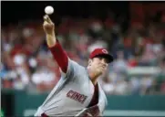  ?? ALEX BRANDON — THE ASSOCIATED PRESS ?? Cincinnati Reds starting pitcher Matt Harvey throws during the third inning of the second baseball game of a doublehead­er against the Washington Nationals at Nationals Park, Saturday, in Washington.