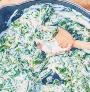  ?? LAUREN VOLO/THEKITCHN.COM. ?? Fresh baby spinach is best for making creamed spinach, but frozen works, too.