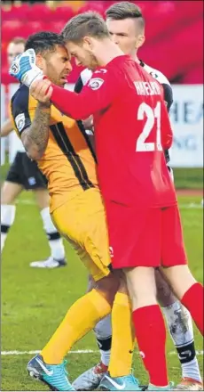  ??  ?? Gateshead keeper Dan Hanford loses his cool and headbutts Jai Reason