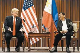  ?? ROLEX DELA PENA/EPA ?? President Donald Trump said Monday he and Philippine President Rodrigo Duterte have “had a great relationsh­ip.” They met at the Associatio­n of Southeast Asian Nations event.