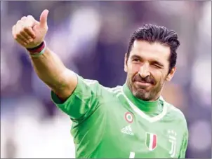  ?? MARCO BERTORELLO/AFP ?? Juventus goalkeeper Gianluigi Buffon celebrates at the end of their Serie A match with Sassuolo on at the Allianz Stadium in Turin on Sunday.