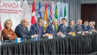  ?? CP PHOTO RYAN REMIORZ ?? Canadian premiers and the Prime Minister speak to the media at the First Ministers closing news conference, Friday in Montreal.